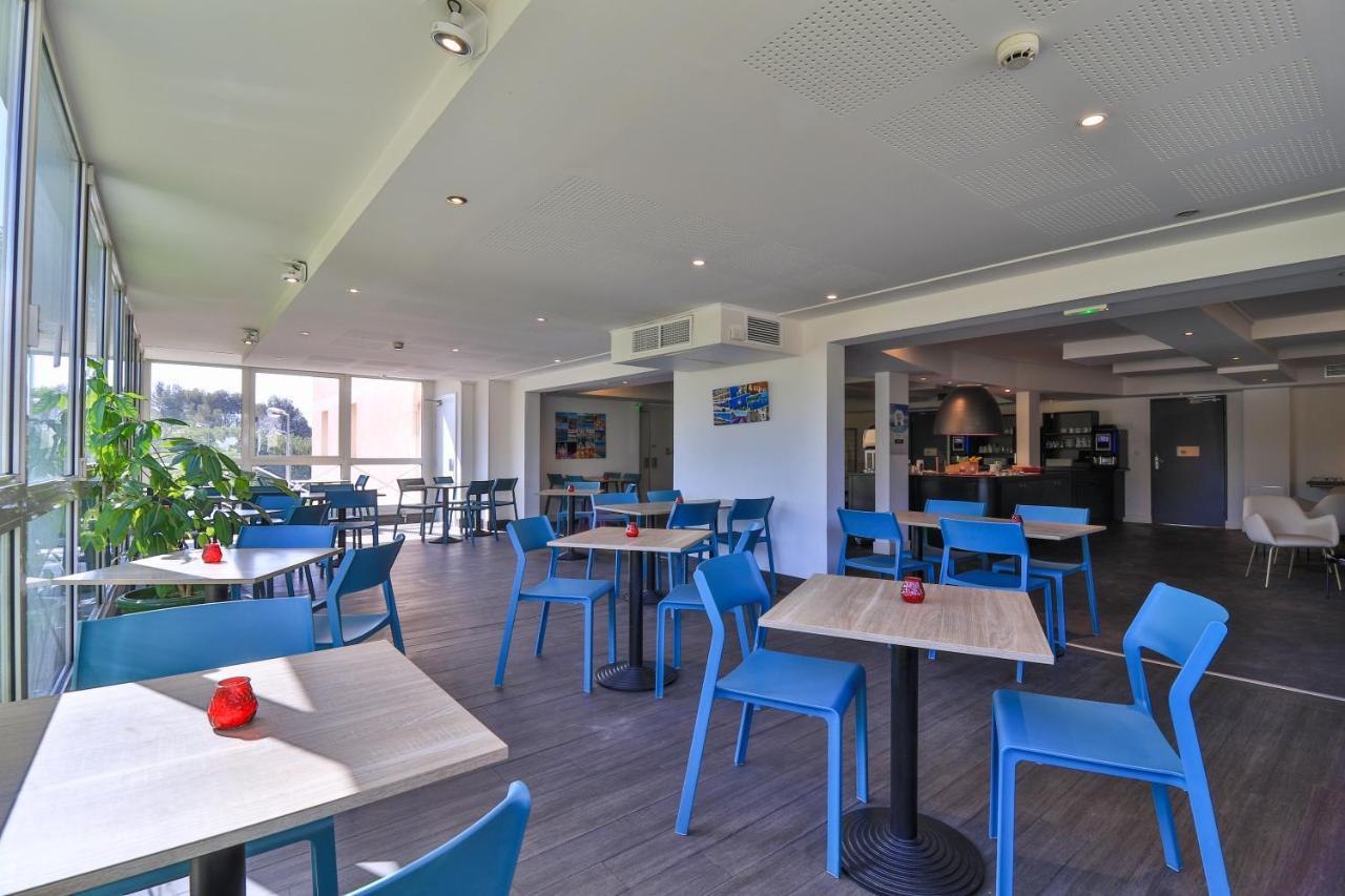 Hotel Restaurant Kyriad Fréjus Exteriör bild