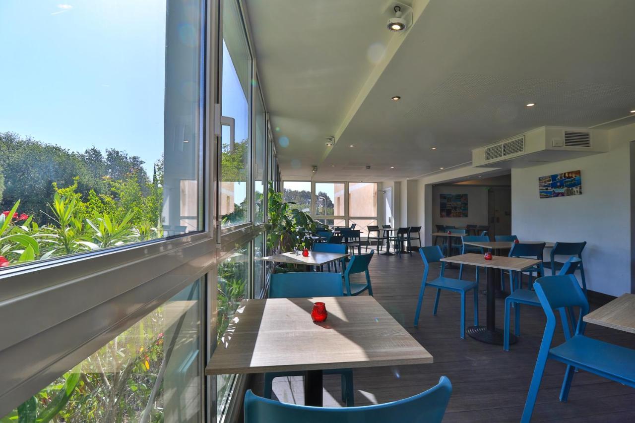 Hotel Restaurant Kyriad Fréjus Exteriör bild